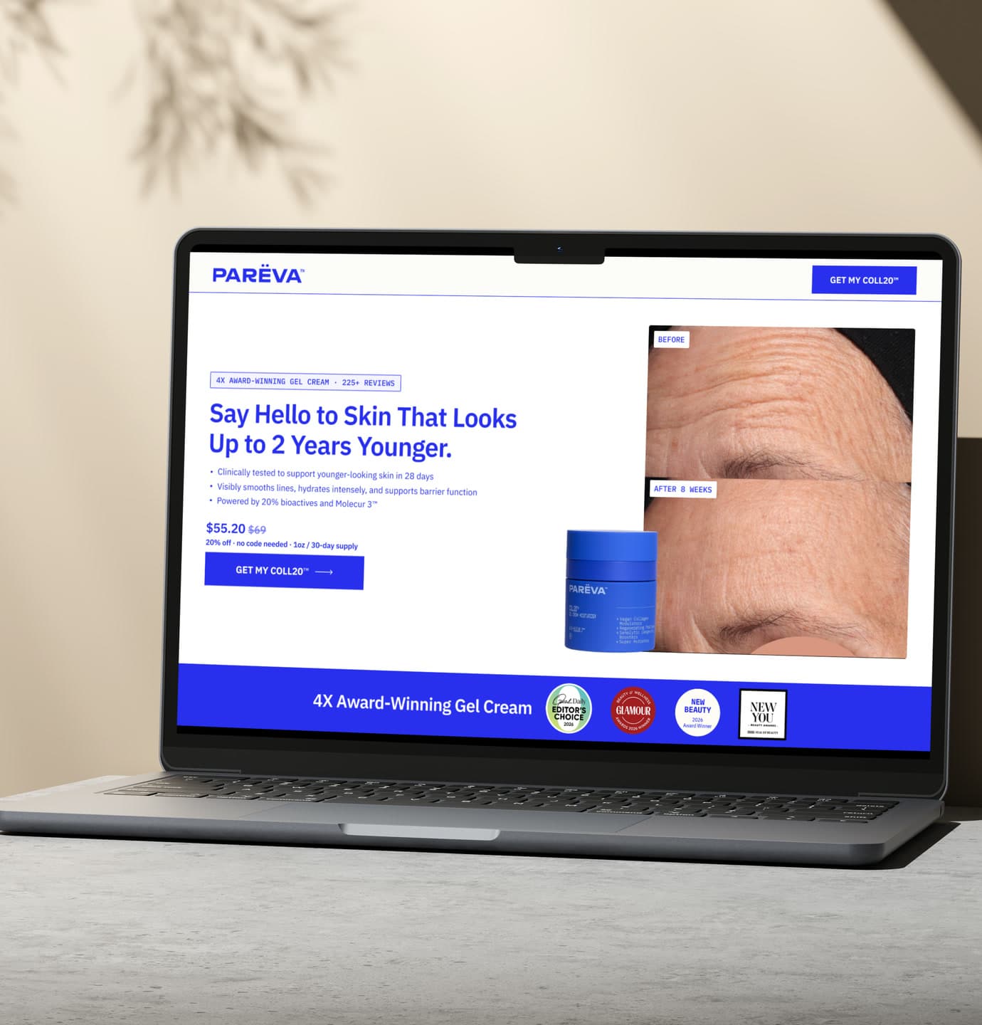 The Pareva Beauty product landing page on a laptop on a pale stone surface, showing the blue gel-cream jar beside a pair of before-and-after skin close-ups.